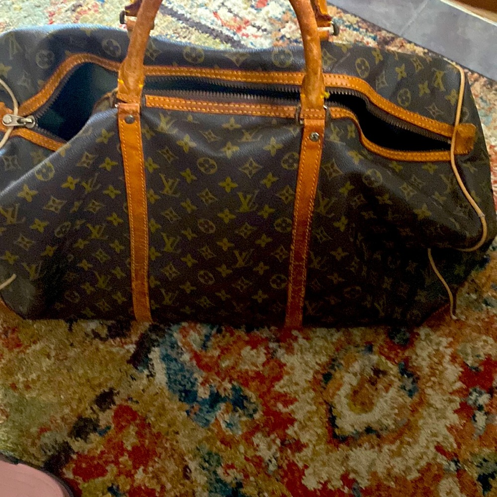 Louis Vuitton vintage purse and duffle travel bag